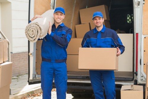 Twickenham Man And Van team sorting recyclable materials during a local move