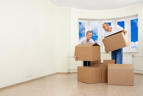 Man and van removal team loading furniture in Twickenham