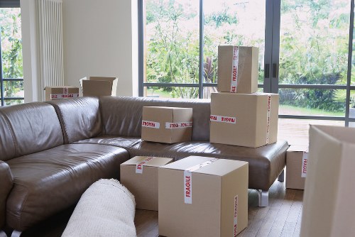 Professional movers loading items for a Twickenham house move