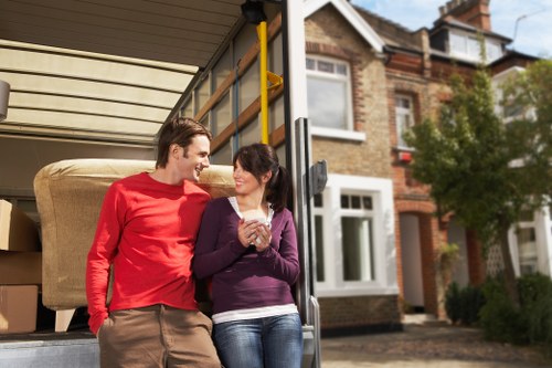 Staff training in safe lifting and moving techniques during a house move