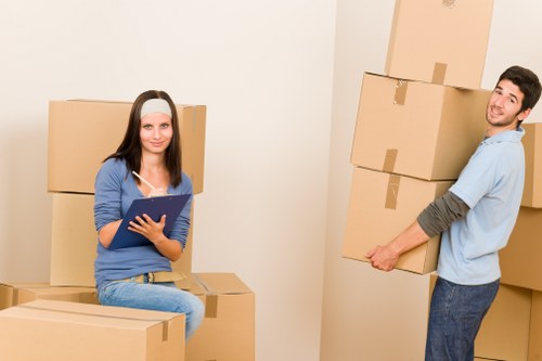 Packed boxes and furniture ready for home removals