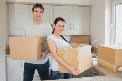 Van service helping with furniture delivery in a Twickenham home